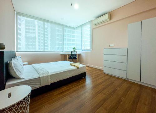 Postel nebo postele na pokoji v ubytování La Casa Hostel KLCC