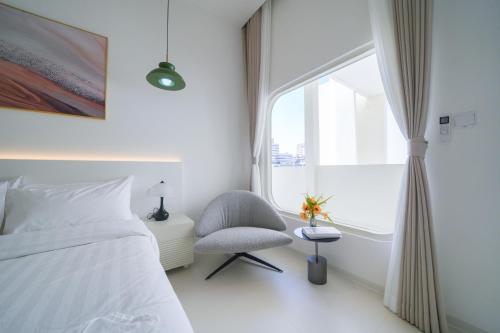 Ένα ή περισσότερα κρεβάτια σε δωμάτιο στο Pattaya Interstellar Village Resort House