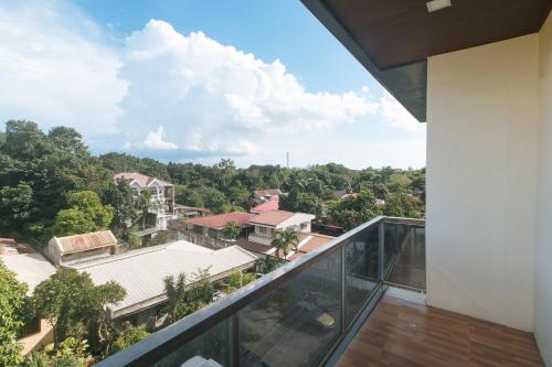 a view from the balcony of a house at RedDoorz at Casa Barcelona Condotel in Iloilo City