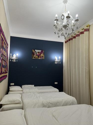 Talat Hotel Samarkandにあるベッド