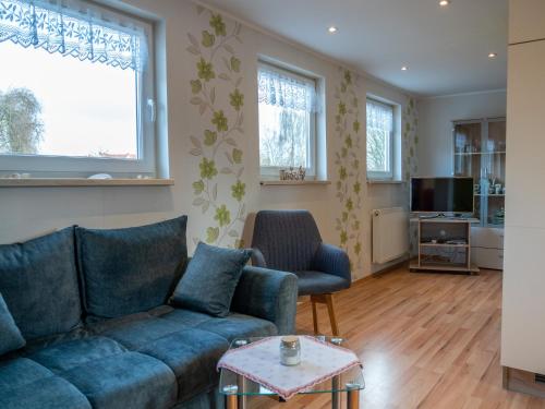 TV a/nebo společenská místnost v ubytování As bi uns to Huus