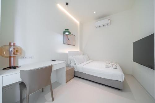 Ένα ή περισσότερα κρεβάτια σε δωμάτιο στο Pattaya Interstellar Village Resort House