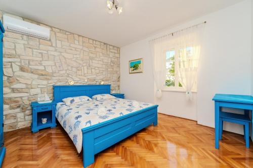 House for rent "Figurica" Lunにあるベッド