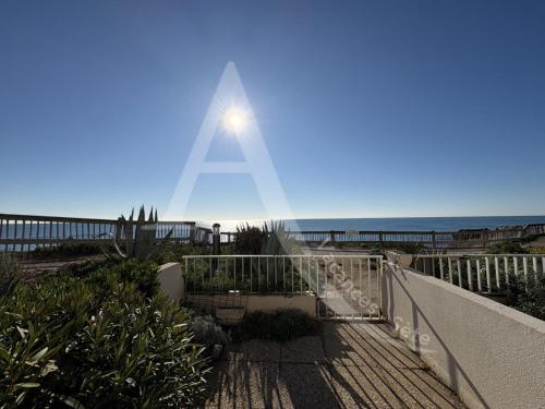 T2 en rez de jardin, face a la mer avec parking