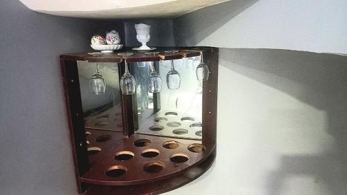 a mirror hanging on a wall with cupcakes at Budget Friendly 2bedDuplex , 15 mins to the Airport in Lagos