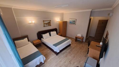 Ένα ή περισσότερα κρεβάτια σε δωμάτιο στο Elite Hotel City Center Corlu Bed and Breakfast