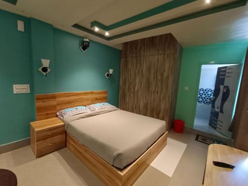 Ένα ή περισσότερα κρεβάτια σε δωμάτιο στο La Haven Guest House