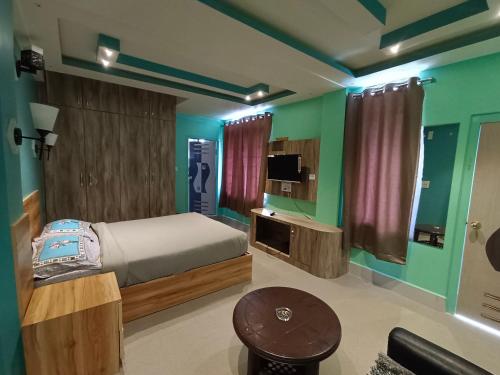 Ένα ή περισσότερα κρεβάτια σε δωμάτιο στο La Haven Guest House