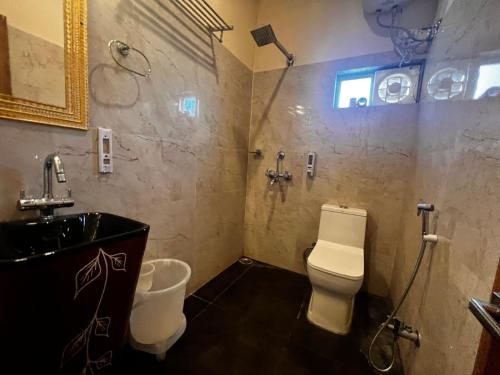 Vannituba majutusasutuses Sambha Hotel