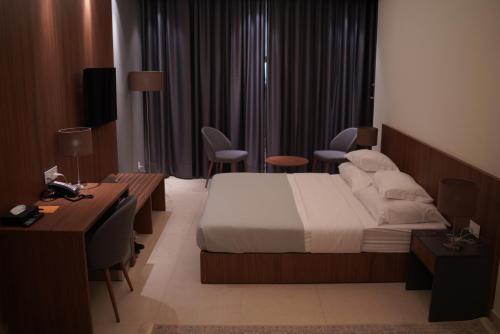 Katil atau katil-katil dalam bilik di Nassim Al Najaf Hotel