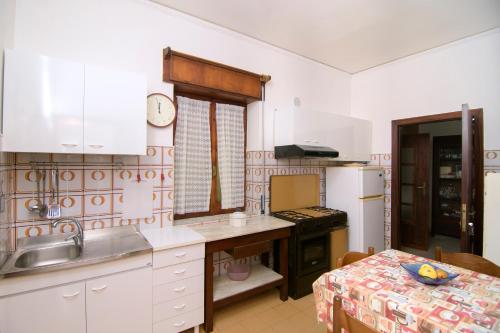 Una cocina o zona de cocina en Pensione Zio Attilio