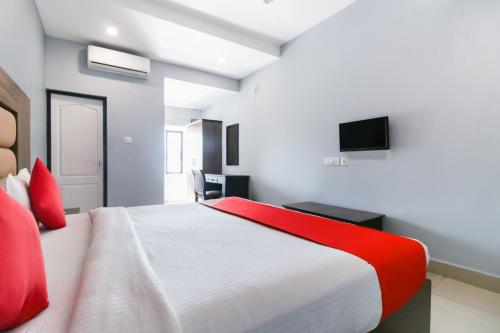 TV a/nebo společenská místnost v ubytování Queens Residency - Kochi