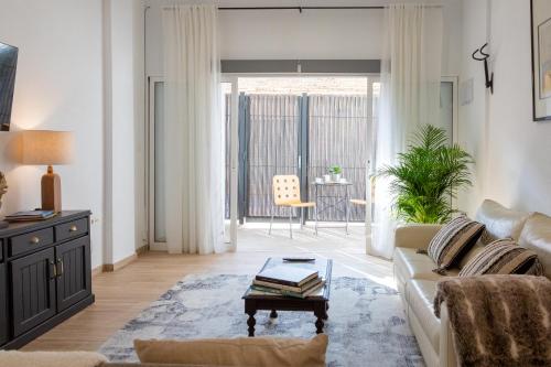 Posezení v ubytování Oasis Urbano Elche - Terraza y Vistas al Palmeral junto al Centro