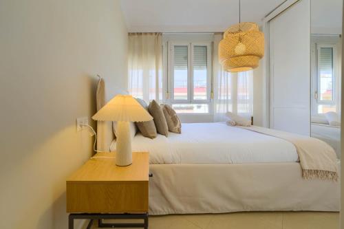 Postel nebo postele na pokoji v ubytování Sevilla Exclusive Apartment - Prime Location