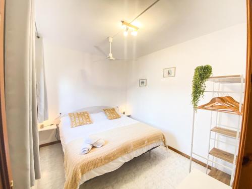 Ένα ή περισσότερα κρεβάτια σε δωμάτιο στο El Penell Apartament Llevant