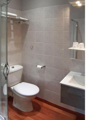 Ένα μπάνιο στο Hôtel & Appartements Le Florence