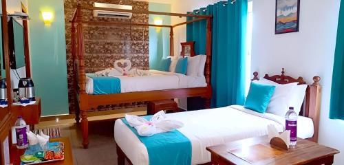 Ένα ή περισσότερα κρεβάτια σε δωμάτιο στο Le Holiday Inn