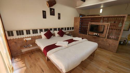 Postel nebo postele na pokoji v ubytování SeaFORT Beach Resort