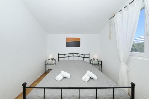 Posteľ alebo postele v izbe v ubytovaní House Dolphin