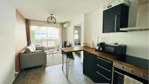 T2 centre ville/Plage/Commerces/Clim