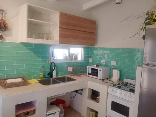 Kuchyň nebo kuchyňský kout v ubytování Refugio de Soles