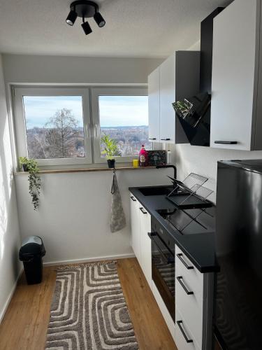 Η κουζίνα ή μικρή κουζίνα στο Zentrales Apartment an der BigBox