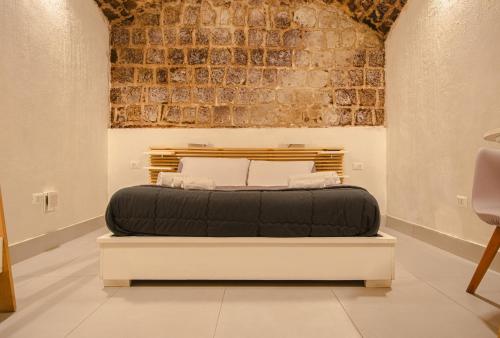 A bed or beds in a room at I Gradini