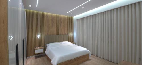 Katil atau katil-katil dalam bilik di Shkodra Trend Apartment