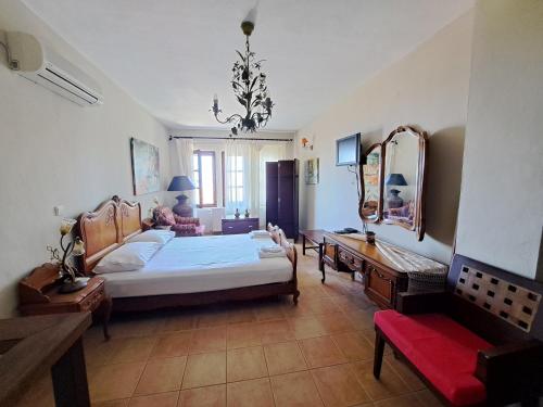 Postel nebo postele na pokoji v ubytování Smaragdi Luxury Apartments