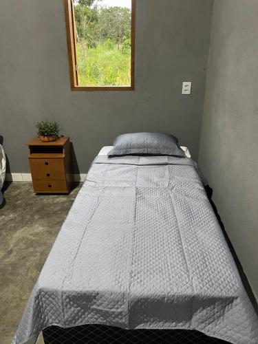 Postel nebo postele na pokoji v ubytování Chalé Barú