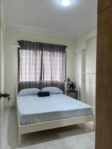 Postel nebo postele na pokoji v ubytování Ampang Menara Jade City View