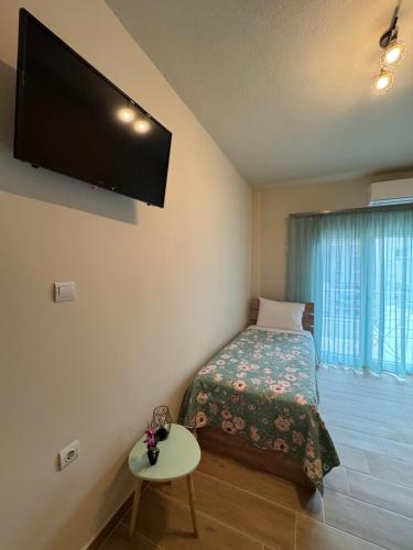 Ένα ή περισσότερα κρεβάτια σε δωμάτιο στο Secret Garden Guesthouse