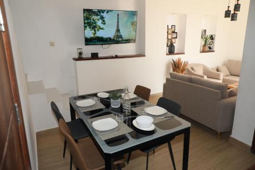 Posezení v ubytování Duplex au bord du fleuve