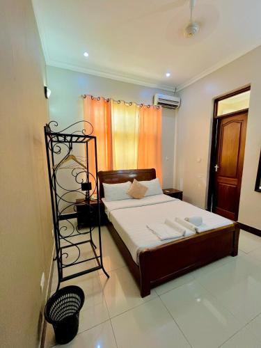 Katil atau katil-katil dalam bilik di Shavilla Hotel