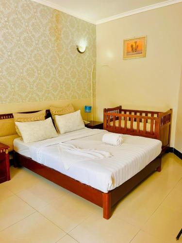 Katil atau katil-katil dalam bilik di Shavilla Hotel