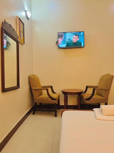 Televisyen dan/atau pusat hiburan di Shavilla Hotel