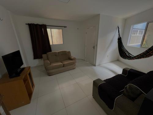 Χώρος καθιστικού στο Apartamento no Centro de Jacumã 2 Quartos