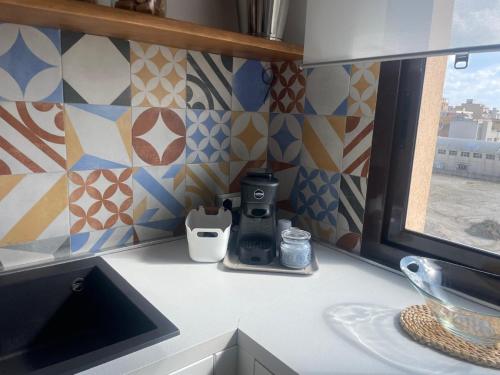 Tetera y cafetera en L'isola'