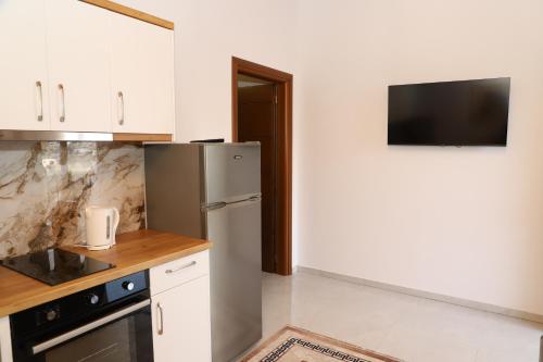 Η κουζίνα ή μικρή κουζίνα στο Villa Kince