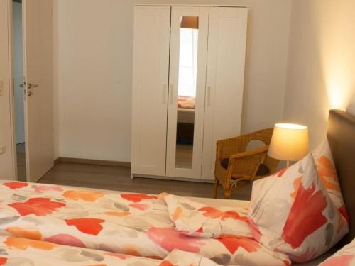 Postel nebo postele na pokoji v ubytování Ferienwohnung Gute Zeit - Apartment 2