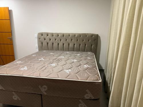 Postel nebo postele na pokoji v ubytování Condomínio Ouro Vilas