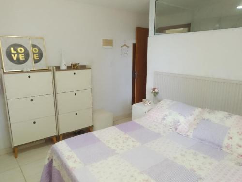 Ένα ή περισσότερα κρεβάτια σε δωμάτιο στο Casa aconchegante