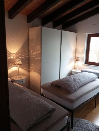 Postel nebo postele na pokoji v ubytování GOLF-Lodge