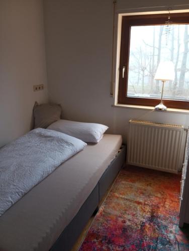 Postel nebo postele na pokoji v ubytování GOLF-Lodge