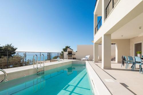 Villa Maris & Ivana Brela 2x28m2 heated pool gym