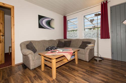 Ruang duduk di Ferienhaus Saturn im Sternenpark
