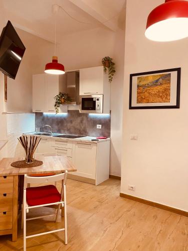 Kuchyň nebo kuchyňský kout v ubytování Porta a Piastri Apartment