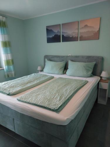 Postel nebo postele na pokoji v ubytování Ferienwohnung Sarah & Thorsten Blum