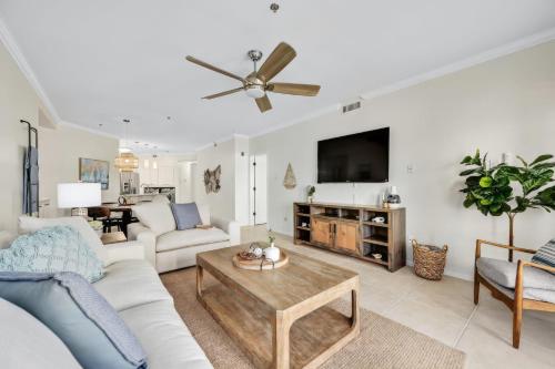 a living room with a couch and a table at Island Summer Sunrises Spa Eats Last Minute Deals! in Lago Vista