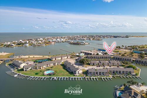 an aerial view of a harbor with a marina at The Cobalt Crab Oasis in Rockport